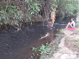 Strangers are caught having sex at the waterfall.